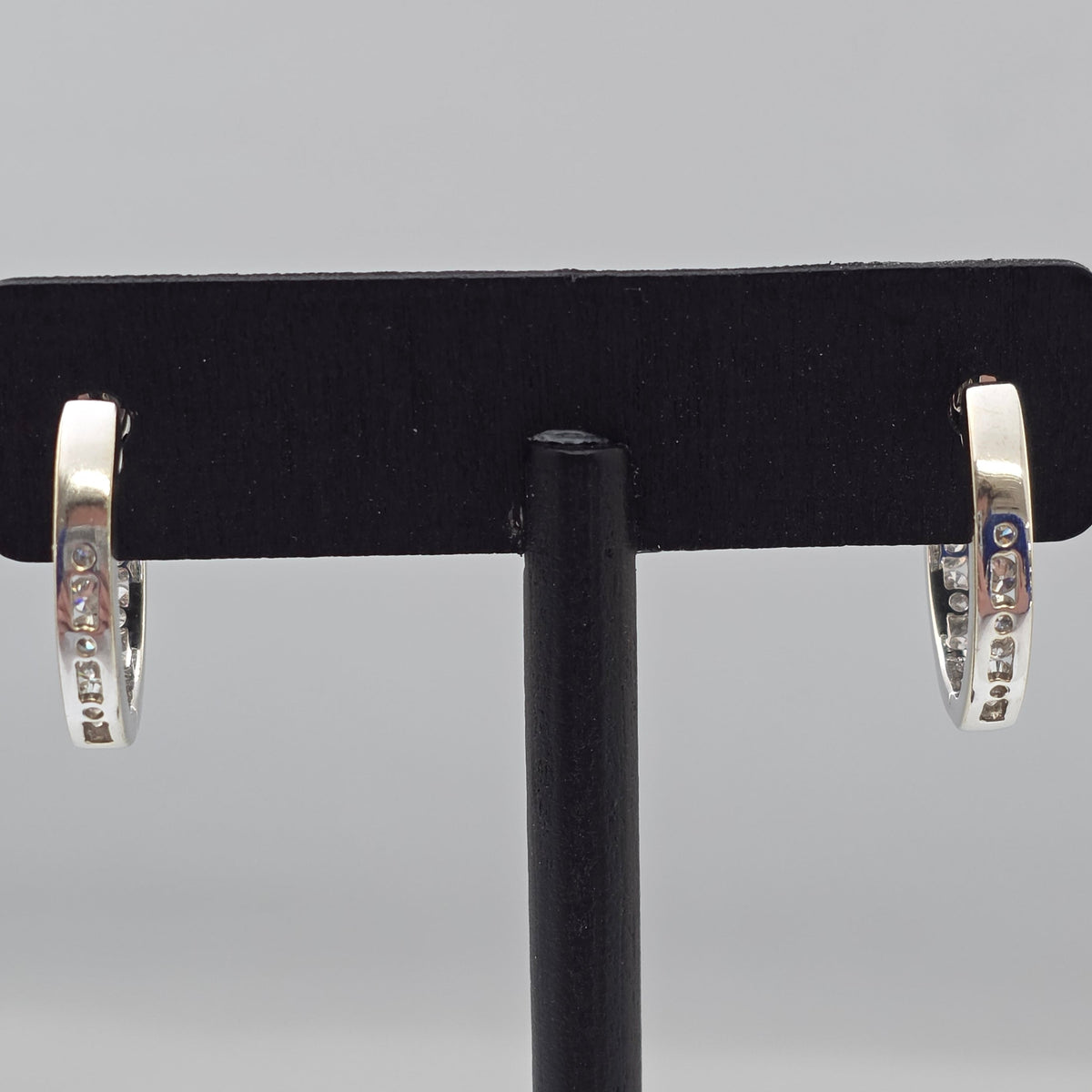 White Gold Channel Set Oval Hoop Earrings