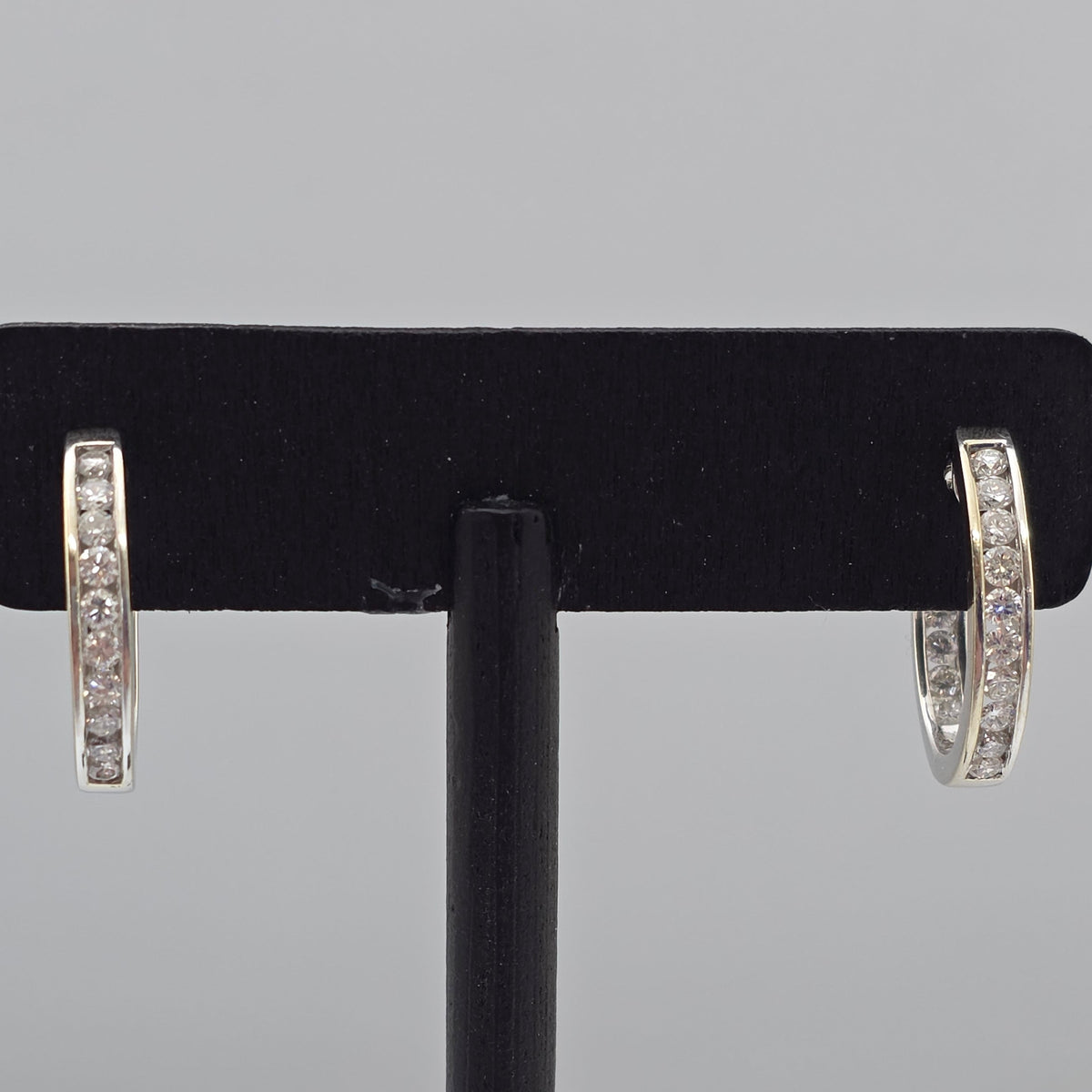 White Gold Channel Set Oval Hoop Earrings